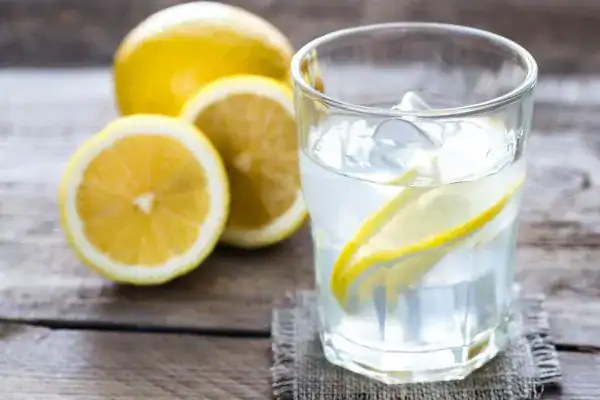 Hydration: The Secret Ingredient for a Toned Stomach and Enhanced Fitness 2 Image of lemon water to aid hydration Hayes