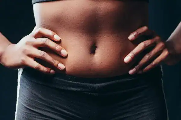 Toning Your Stomach: The Ultimate Guide to Achieving a Sculpted Stomach While Shedding Pounds 1 Image of a toned stomach after non surgical treatment Hayes